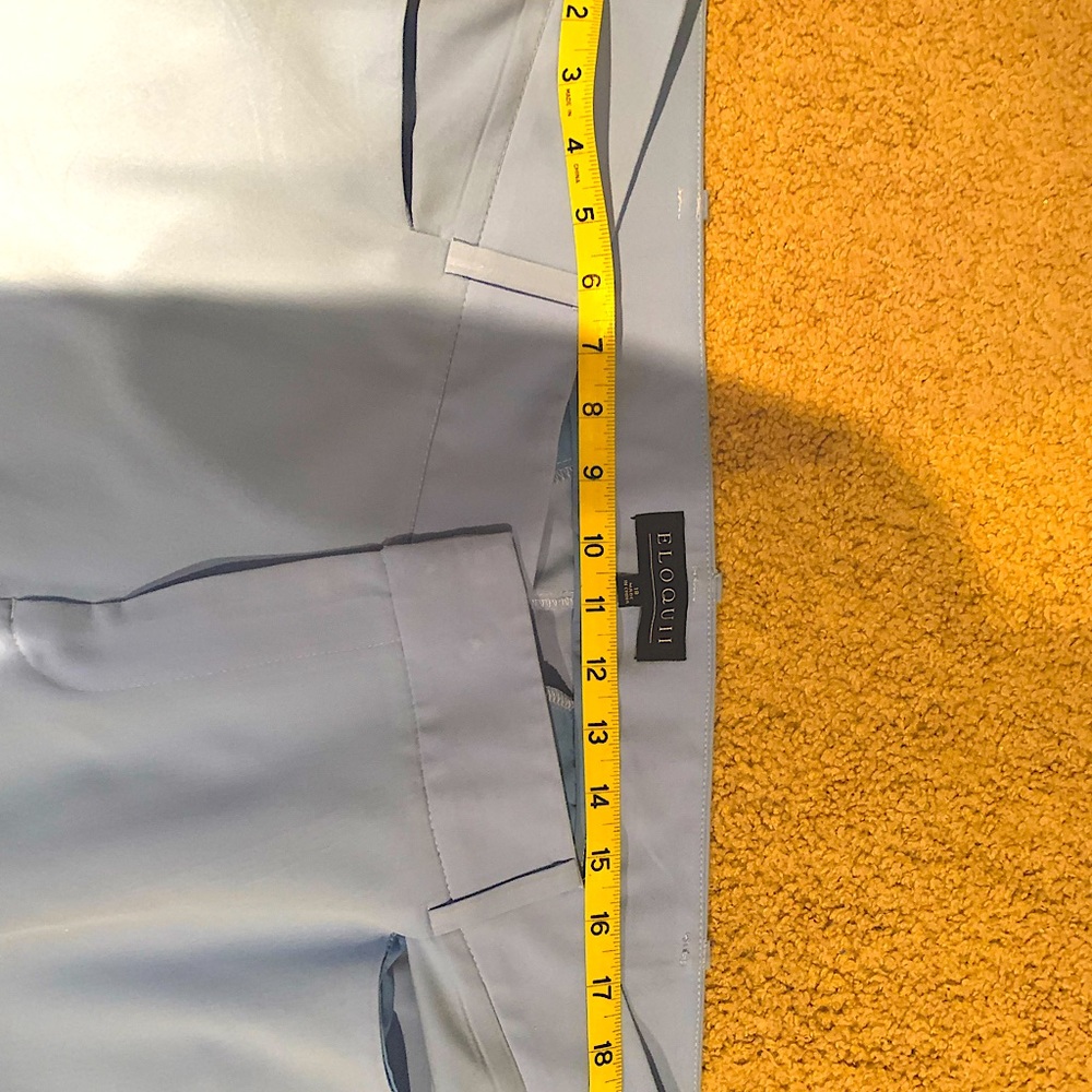 Light blue ELOQUII work pants with pockets. 20” flat measured waist.